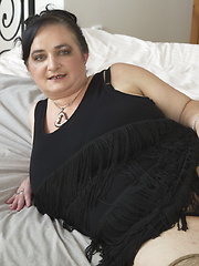 Huge breasted mature BBW playing alone