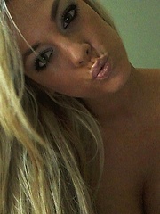 xoGisele wears a tight leather dress and a micro thong while she has some fun with handcuffs and invites you to join in